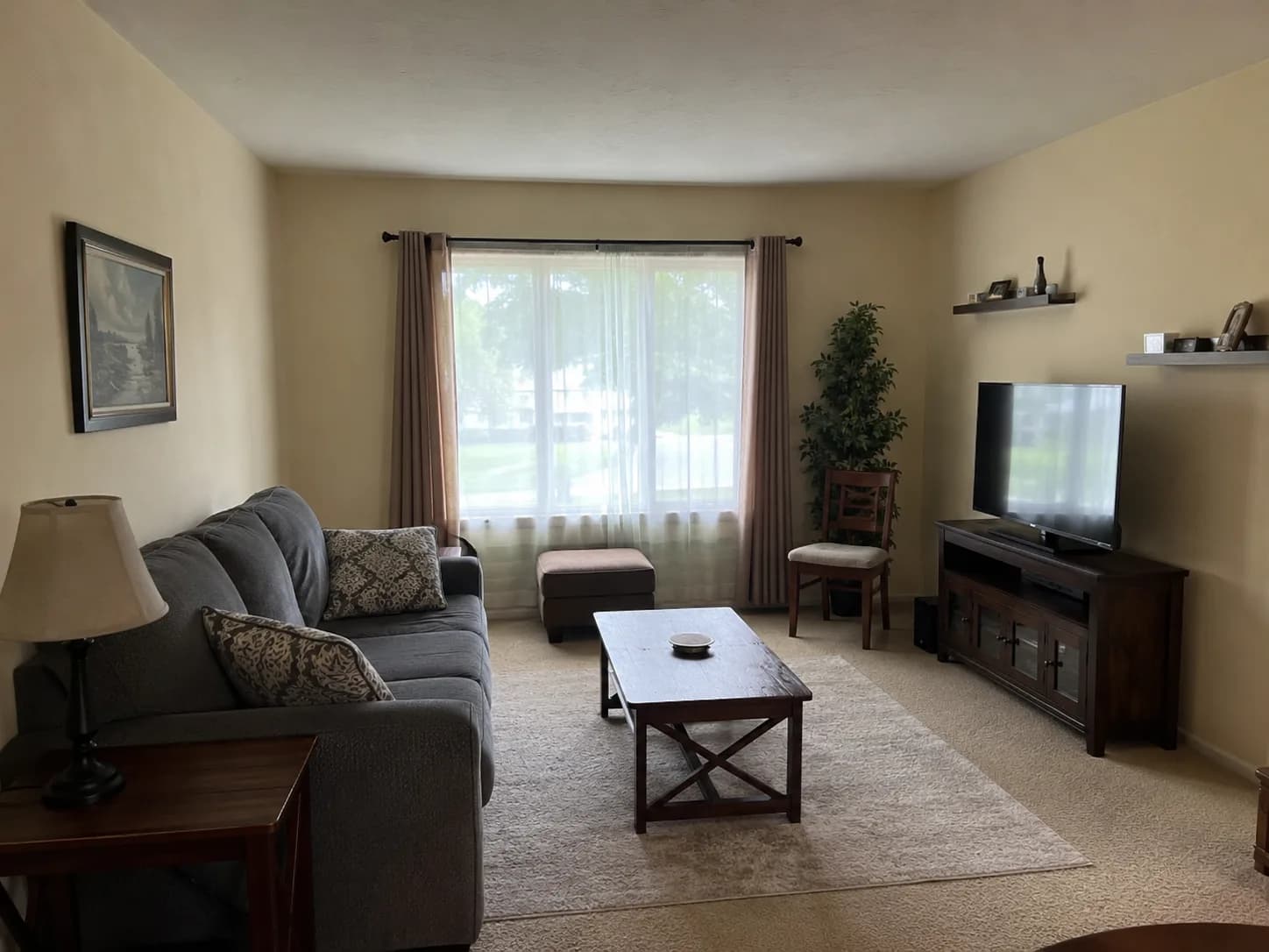 Dated living room before an AI interior makeover